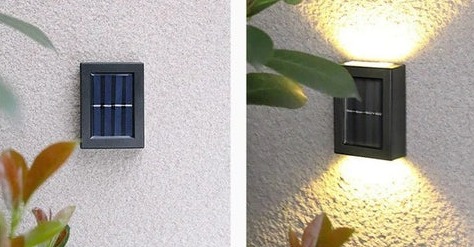Applique solaire éclairant un jardin la nuit