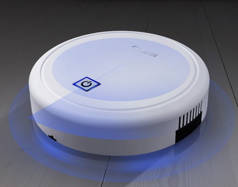 Robot aspirateur AspiClean en charge sur sa station de recharge