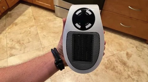 chauffage électrique portable HeatSafe en fonctionnement dans un salon