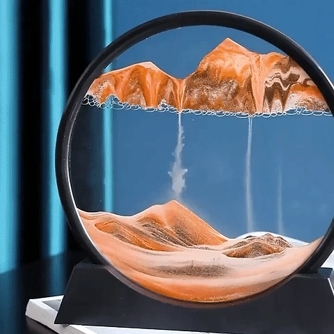 Détail du cadre en verre cristallin et base en acrylique de la lampe sablier