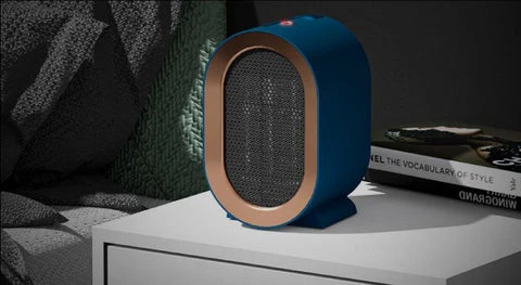 Radiateur HeatSafe posé sur un bureau pour chauffer un espace de travail